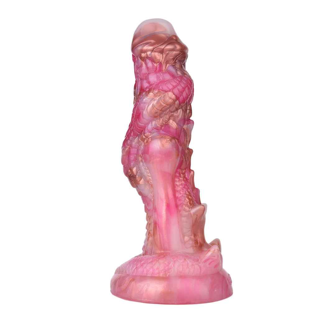 marbled pink fantasy dildo standing on wide flat base