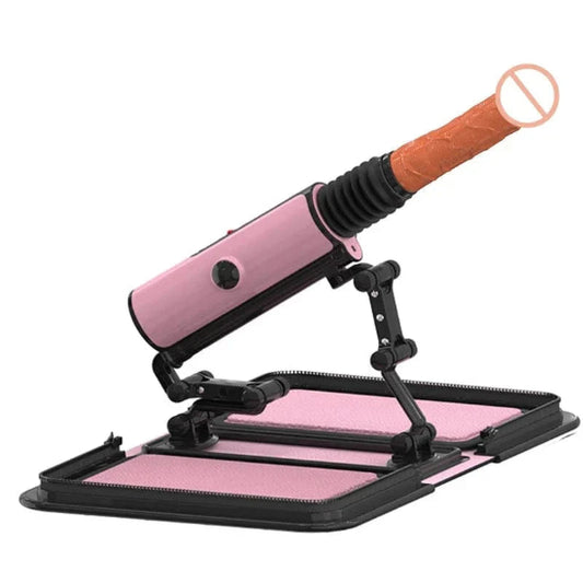 pink leather bag sex machine set up with heated dildo attachment and folding robotic arm