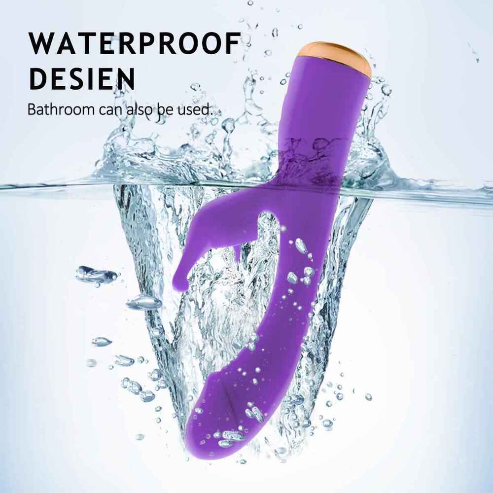submersible waterproof rabbit vibrator with champagne gold base in splashing water