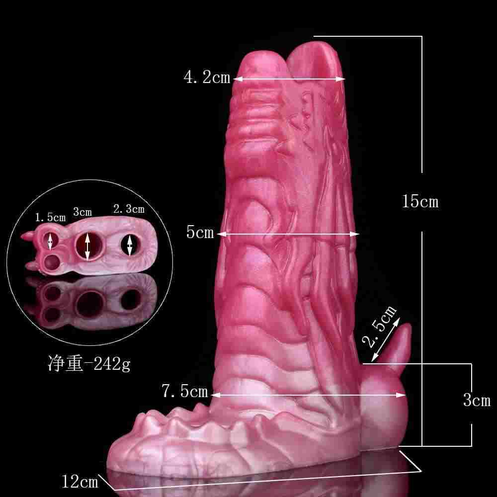flesh toned dragon penis sleeve with a close view of the open jaw opening