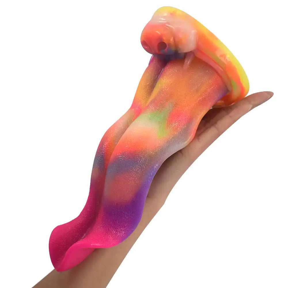  alien tongue fantasy dildo in rainbow silicone held across a hand
