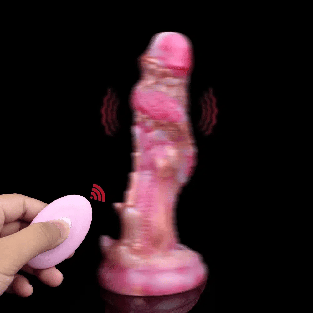 hand holding wireless remote controlling vibrating fantasy dildo